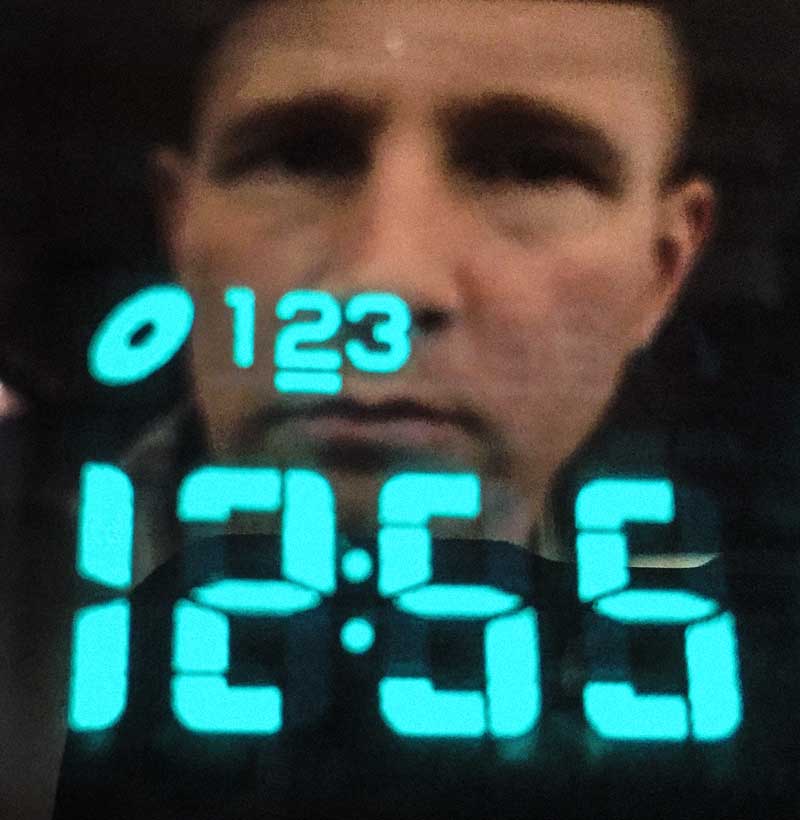 Digital clock art and a reflection portrait.